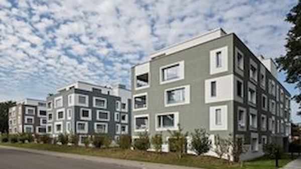 Fundamenta Real Estate steigert Gewinn und hält Dividende stabil