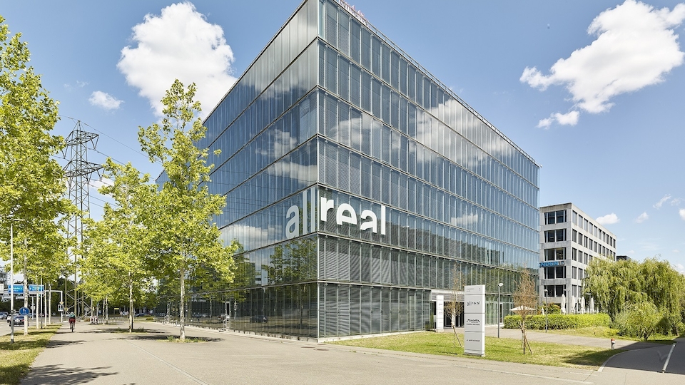 Allreal legt im ersten Halbjahr 2026 operativ zu, der Reingewinn fällt jedoch tiefer aus (Bild: Allreal)